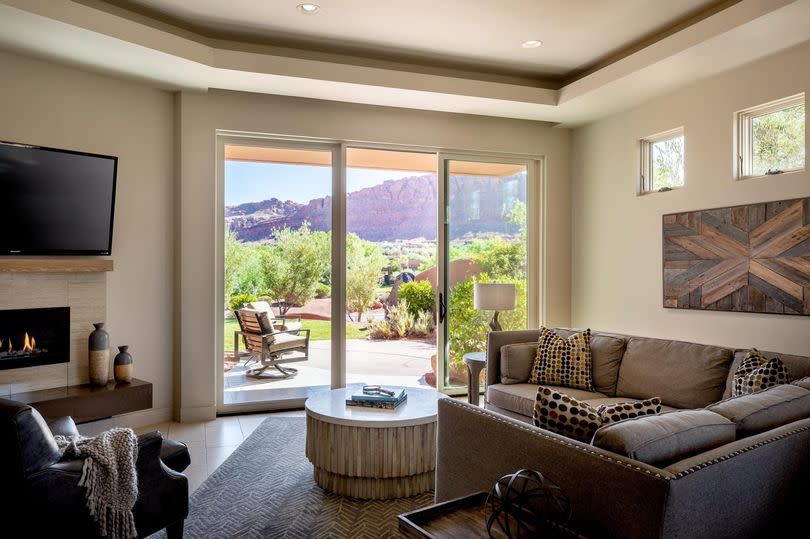 The living room area of one of the luxury lodges at the private, golf community