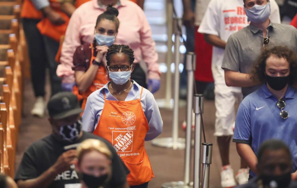 The aftershocks of George Floyd's death are still reverberating for Home Depot. <a href="https://www.gettyimages.com/detail/news-photo/mourners-in-home-depot-aprons-wait-to-view-the-casket-of-news-photo/1218632854?adppopup=true" rel="nofollow noopener" target="_blank" data-ylk="slk:Godofredo A. Vásquez-Pool/Getty Images;elm:context_link;itc:0;sec:content-canvas" class="link ">Godofredo A. Vásquez-Pool/Getty Images</a>