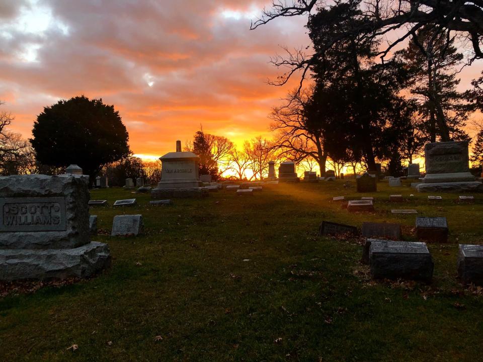 The sun sets over Springdale Cemetery in Peoria on Dec. 21, 2020.
