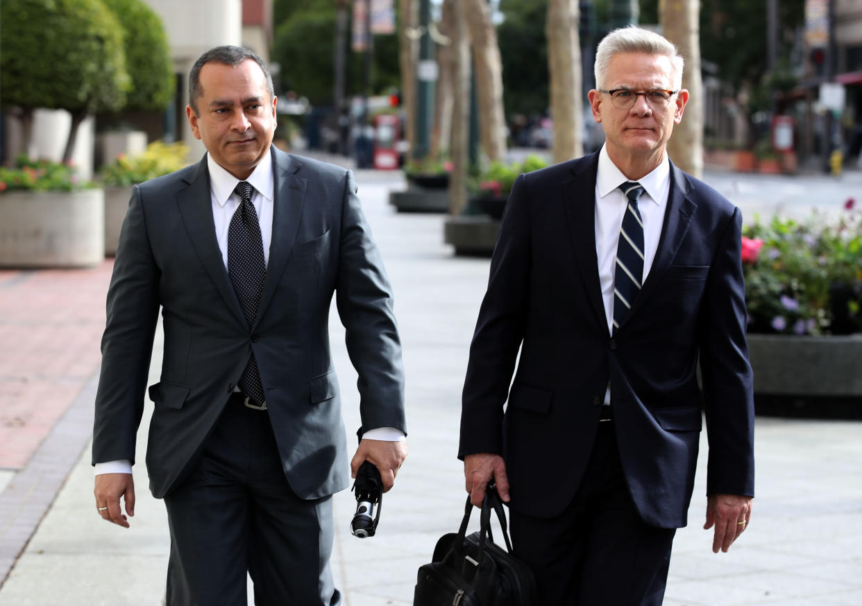 Former Theranos COO Ramesh Balwani leaves the Robert F. Peckham U.S. Federal Court with his attorney on January 14, 2019 in San Jose, Calif. (Photo by Justin Sullivan/Getty Images)