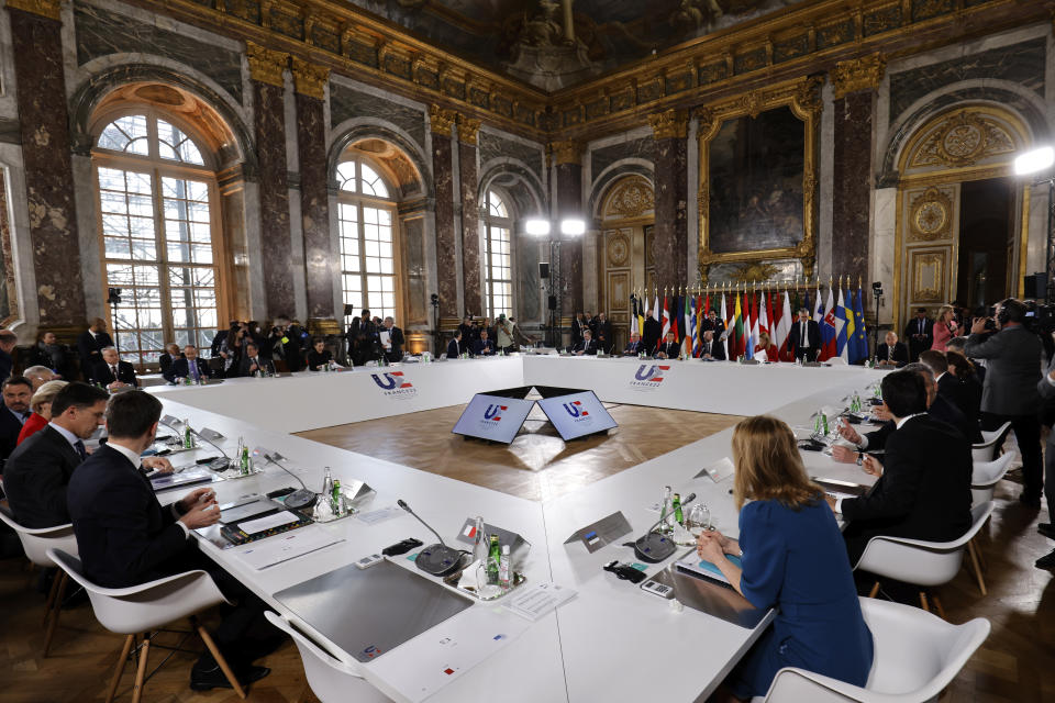 EU leaders attend a summit to discuss the fallout of Russia's invasion in Ukraine, at the Palace of Versailles, near Paris, Thursday, March 10, 2022. European Union leaders have gathered in Versailles for a two-day summit focusing on the war in Ukraine. Their nations have been fully united in backing Ukraine's resistance with unprecedented economic sanctions, but divisions have started to surface on how fast the bloc could move in integrating Ukraine and severing energy ties with Moscow. (Ludovic Marin, Pool via AP)
