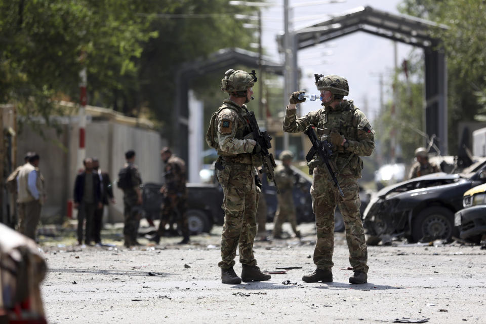 Resolute Support (RS) forces arrive at the site of car bomb explosion in Kabul, Afghanistan, Thursday, Sept. 5, 2019. A car bomb rocked the Afghan capital on Thursday and smoke rose from a part of eastern Kabul near a neighborhood housing the U.S. Embassy, the NATO Resolute Support mission and other diplomatic missions. (AP Photo/Rahmat Gul)