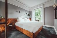 <p>With a central setting in Paddington, <a href="https://www.booking.com/hotel/gb/royal-norfolk.en-gb.html?aid=2200764&label=romantic-hotels-london" rel="nofollow noopener" target="_blank" data-ylk="slk:The Pilgrm;elm:context_link;itc:0" class="link ">The Pilgrm</a> has revitalised an old Victorian building, with an impressive (and regularly rotating) art collection, a lounge with lots of cosy corners, delicious dinners by the former Grain Store chef and a terrace for cocktails with a view (and knitted blankets if it’s chilly). </p><p>You’ll be within walking distance of Marylebone, Hyde Park, Bayswater and Notting Hill. Design details include reclaimed radiators, parquet flooring and petrol-blue carpets, with lots of potted plants, elaborate wrought-iron railings on the staircase and views of the neighbouring residences, too.</p><p><a class="link " href="https://www.booking.com/hotel/gb/royal-norfolk.en-gb.html?aid=2200764&label=romantic-hotels-london" rel="nofollow noopener" target="_blank" data-ylk="slk:CHECK AVAILABILITY;elm:context_link;itc:0">CHECK AVAILABILITY</a></p>