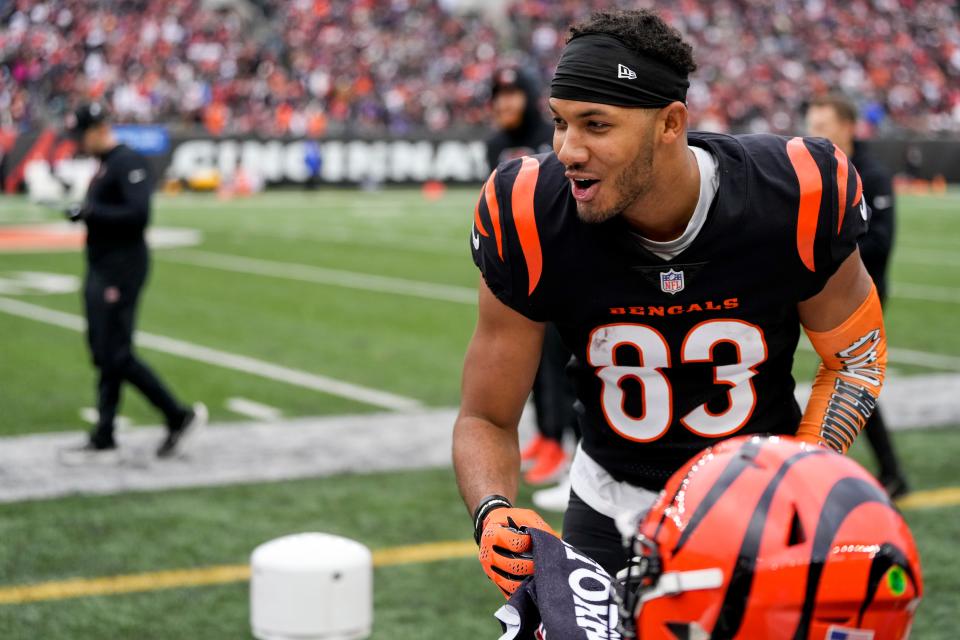 Cincinnati Bengals wide receiver Tyler Boyd (83) laughs as running back Joe Mixon (28) roasts him in the second quarter of the NFL Week 18 game between the Cincinnati Bengals and the Baltimore Ravens at Paycor Stadium in downtown Cincinnati on Sunday, Jan. 8, 2023. The Bengals led 24-7 at halftime.