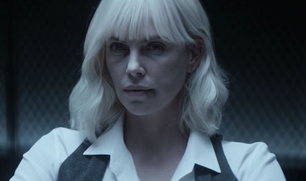 Watch Charlize Theron fight a dude with just *her high heel* in the new “Atomic Blonde” trailer