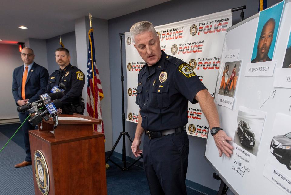 Lt. Ken Schollenberger, of York Area Regional police, talks about the confusion with different cars that were involved in the kidnapping investigation, while speaking during a news conference in York Township Wednesday. Police are searching for Robert Vicosa, who they say is armed and dangerous, and his two daughters.