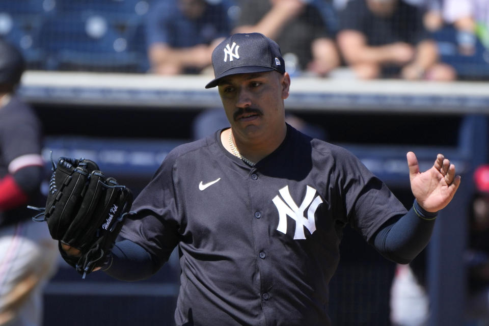 New York Yankees starting pitcher Nestor Cortes reacts after a strikeout in the first inning of a spring training baseball game against the Minnesota Twins Monday, Feb. 26, 2024, in Tampa, Fla. (AP Photo/Charlie Neibergall)