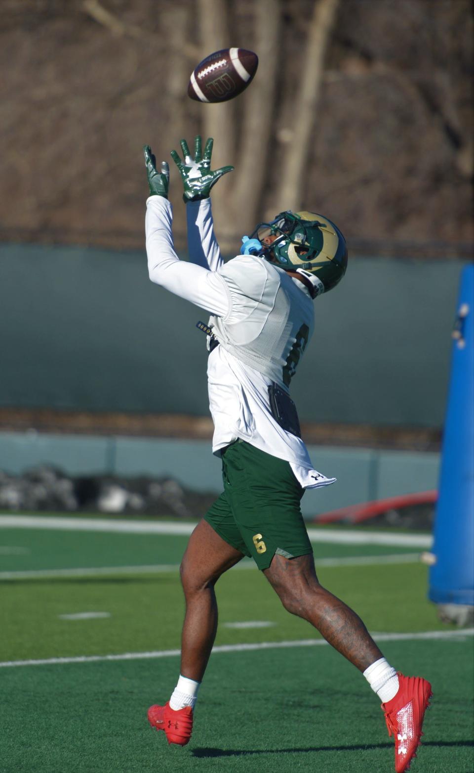 Colorado State football player Donovan Ollie makes a catch during spring practice on Tuesday, April 2, 2024.