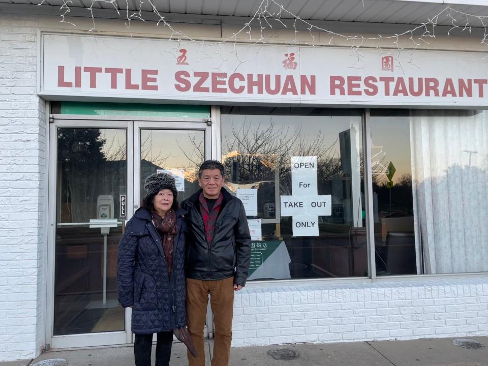 Tair and Su Lee, the former owners of Little Szechuan in Little Silver, in front of their restaurant.