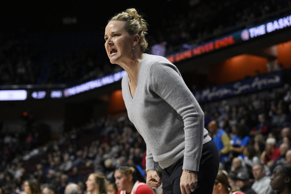 Utah head coach Lynne Roberts reacts in the first half of an NCAA college basketball game against South Carolina, Sunday, Dec. 10, 2023, in Uncasville, Conn. (AP Photo/Jessica Hill)