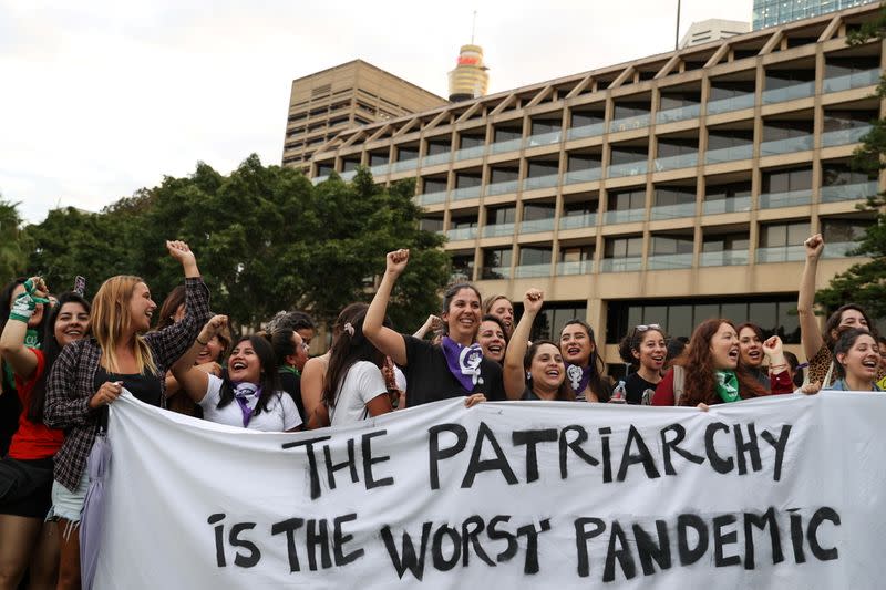 People participate in a rally for International Women's Day in Sydney