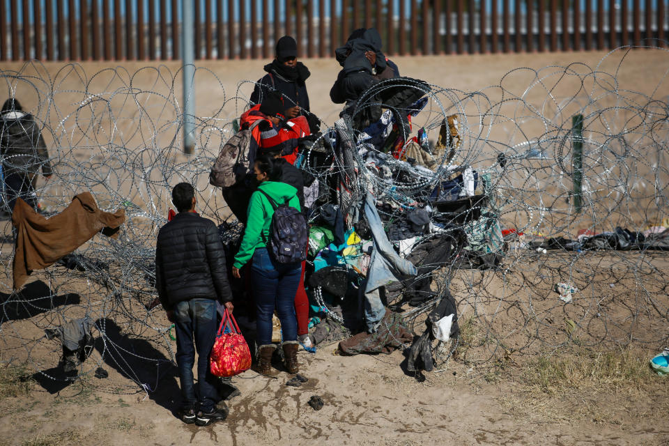 Migrants try to cross the U.S.-Mexico border in Ciudad Juarez, Mexico, on Dec. 27, 2023.  / Credit: Christian Torres/Anadolu via Getty Images