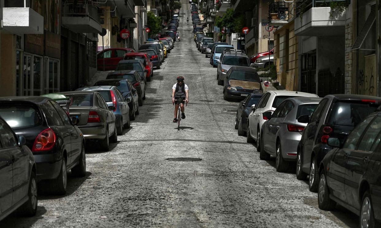 <span>‘The most vulnerable of pedestrians have almost disappeared from public areas’ in Athens.</span><span>Photograph: Aris Messinis/AFP/Getty Images</span>