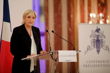 Marine Le Pen, French National Front (FN) political party leader and candidate for French 2017 presidential election, attends a news conference in Paris, France, April 10, 2017. REUTERS/Benoit Tessier