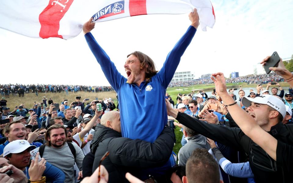 Team Europe's Tommy Fleetwood celebrates Europe's overall victory during the Singles match on day three of the Ryder Cup - PA