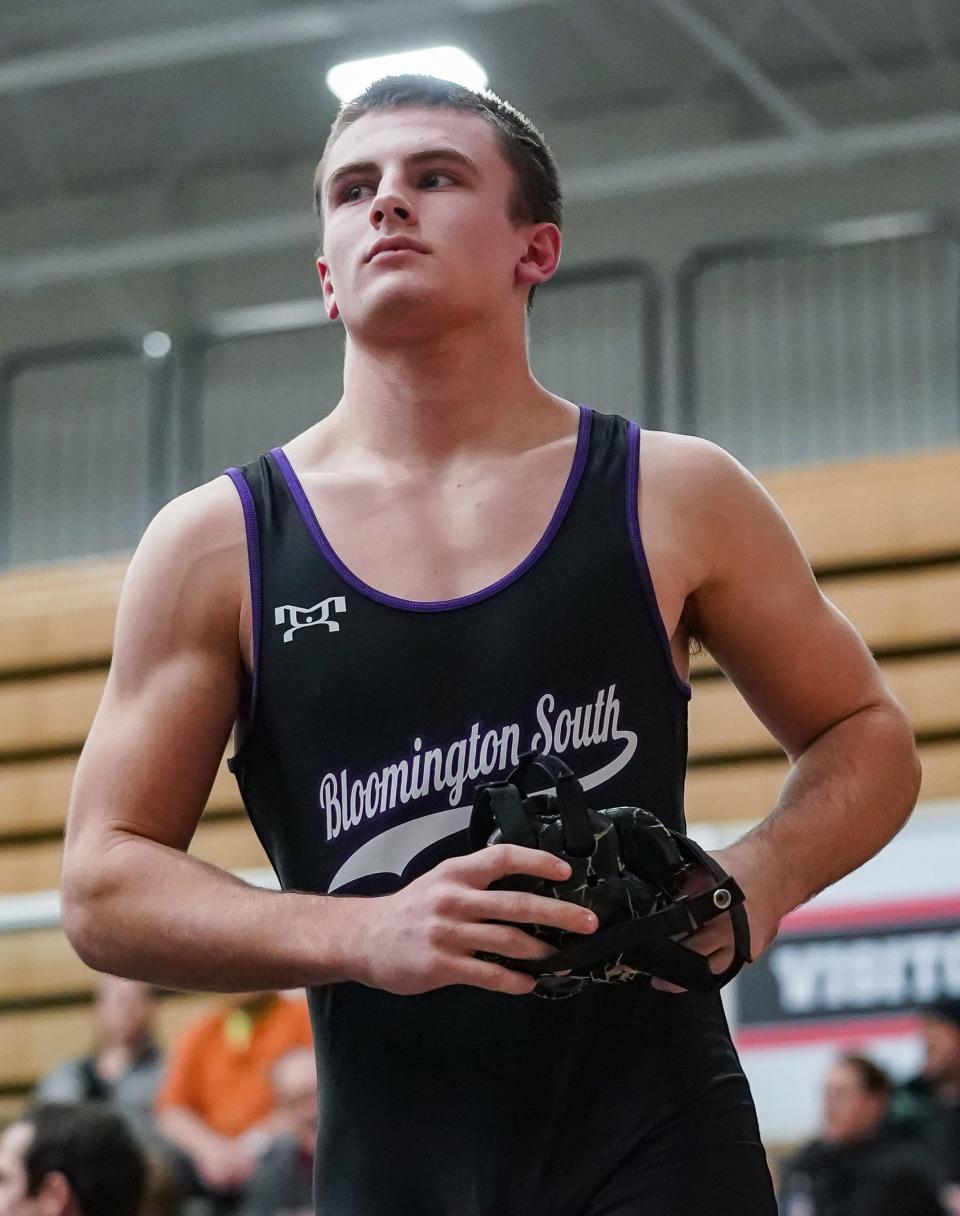 Bloomington South’s Evan Roudebush receives a forfeit win in the 165-pound match during South’s dual meet at Edgewood on Thursday, Jan. 18, 2024.