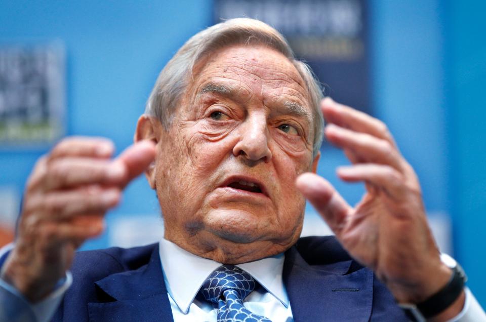 In this file photo dated Saturday, Sept. 24, 2011, George Soros speaks during a forum at the IMF/World Bank annual meetings in Washington.