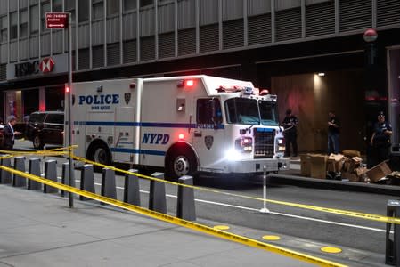 A New York City Police Department Bomb Squad truck is seen near the Fulton Street subway station as police said they were investigating two suspicious packages in Manhattan