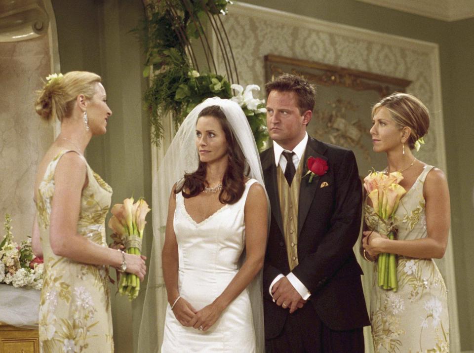 Lisa Kudrow as Phoebe Buffay, Courteney Cox as Monica Geller, Matthew Perry as Chandler Bing, and Jennifer Aniston as Rachel Green on season seven of "Friends."