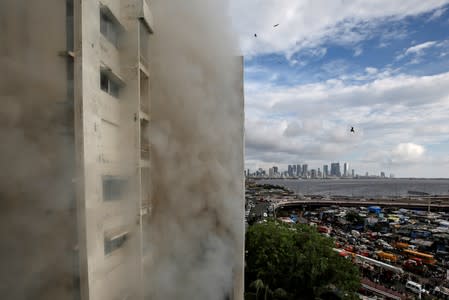 Smoke is seen coming out of Mahanagar Telephone Nigam Limited building after a fire broke out, in Mumbai