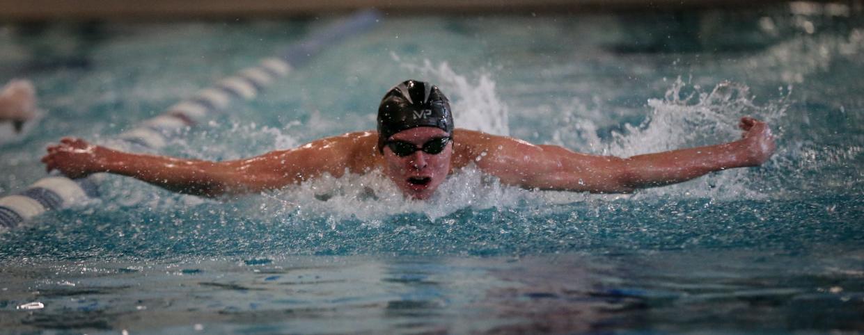 Milan's Andrew Dobrzanski swims the individual medley at the Monroe County Championships last season.