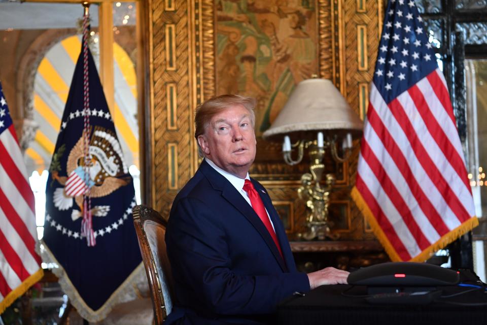 President Donald Trump answers questions from reporters after making a video call at his Mar-a-Lago estate in Palm Beach, Florida, in December 2019. (Photo: NICHOLAS KAMM/AFP via Getty Images)