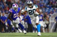 Aug 9, 2018; Orchard Park, NY, USA; Carolina Panthers running back C.J. Anderson (20) runs with the ball in front of Buffalo Bills linebacker Ramon Humber (50) during the third quarter at New Era Field. Rich Barnes-USA TODAY Sports