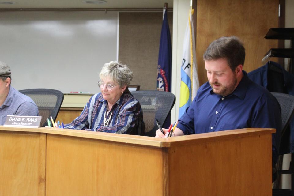 After being given his oath of office by Cheboygan City Clerk Alyssa Singles, Adam Bedwin was able to join the rest of the council members and participate in the rest of the regular city council meeting Tuesday night. 