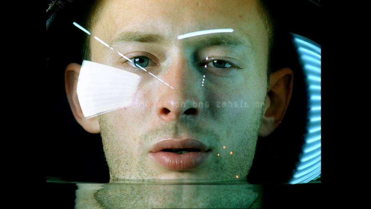  A screenshot of the No Surprises video, Thom Yorke's face in a fish bowl slowly filling up with water 