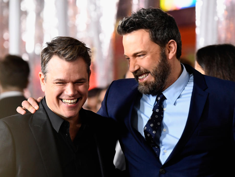 Ben and Matt smiling together at a media event