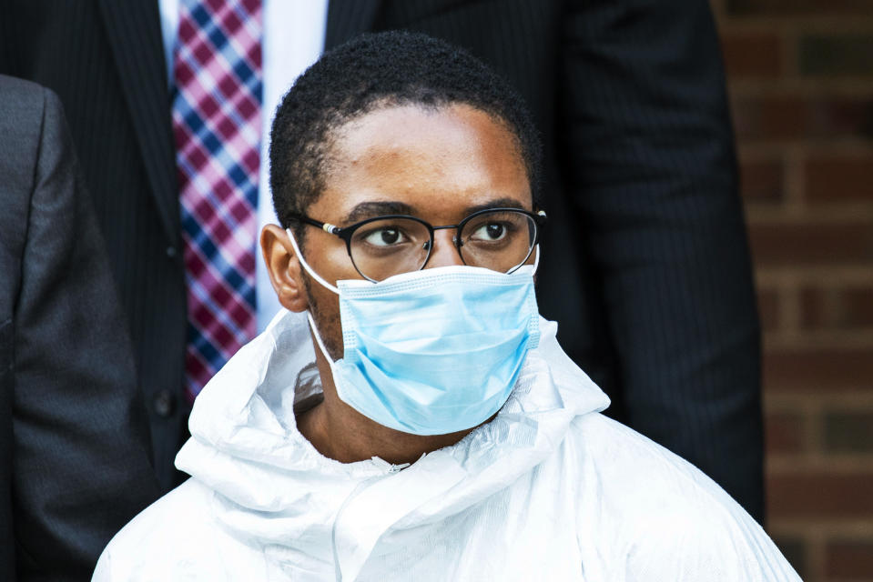 Tyrese Haspil, 21, is escorted out of the 7th precinct by NYPD detectives, Friday, July 17, 2020, in New York. Haspil faces a murder charge in the death of Fahim Saleh, 33-year-old tech entrepreneur who was found dismembered inside his luxury Manhattan condo. (AP Photo/Eduardo Munoz Alvarez)