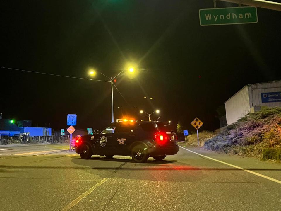 A Redding police cruiser is parked on Highway 273 at Wyndam Lane on Tuesday, Aug. 23, 2022, after a deadly collision involving a pedestrian and a vehicle.
