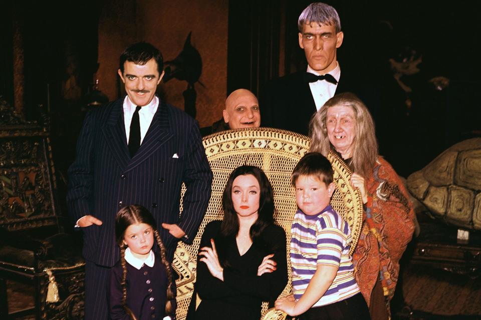 THE ADDAMS FAMILY, (front row)  Lisa Loring, Carolyn Jones (seated), Ken Weatherwax,  (back row)  Jo
