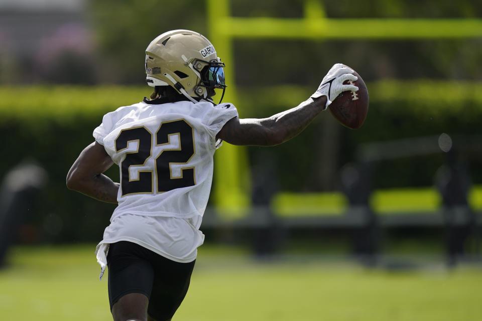 New Orleans Saints defensive back C.J. Gardner-Johnson (22) runs to the end zone after intercepting a pass by <a class="link " href="https://sports.yahoo.com/nfl/players/28389/" data-i13n="sec:content-canvas;subsec:anchor_text;elm:context_link" data-ylk="slk:Jameis Winston;sec:content-canvas;subsec:anchor_text;elm:context_link;itc:0">Jameis Winston</a> during training camp at their NFL football training facility in Metairie, La., Saturday, July 30, 2022. (AP Photo/Gerald Herbert)