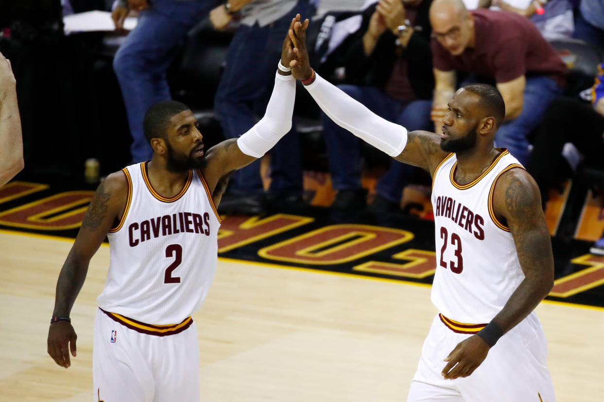 LeBron James and Kyrie Irving will no longer be teammates. (Getty)