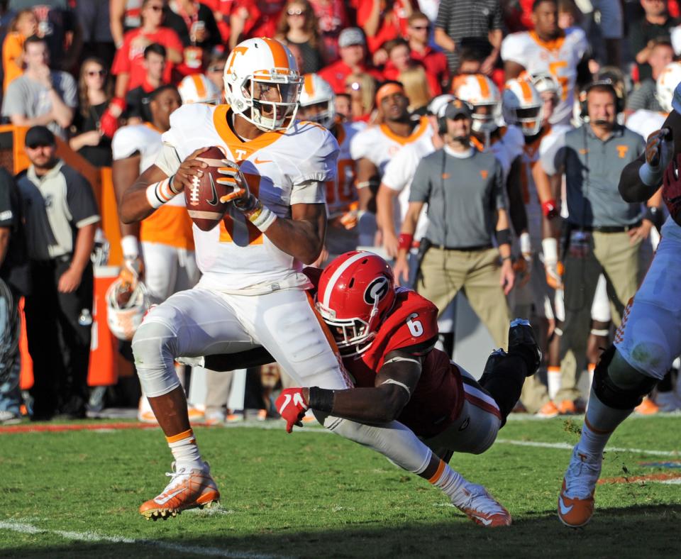 ATHENS, GA – OCTOBER 1: Joshua Dobbs #11 of the Tennessee Volunteers is sacked by Natrez Patrick #6 of the Georgia Bulldogs at Sanford Stadium on October 1, 2016 in Athens, Georgia. (Photo by Scott Cunningham/Getty Images)