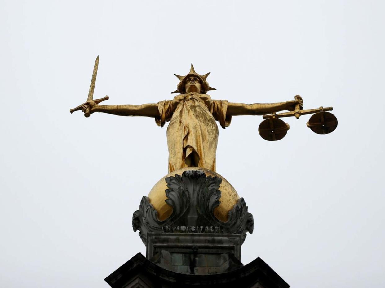 A statue of Lady Justice outside the Old Bailey: Reuters