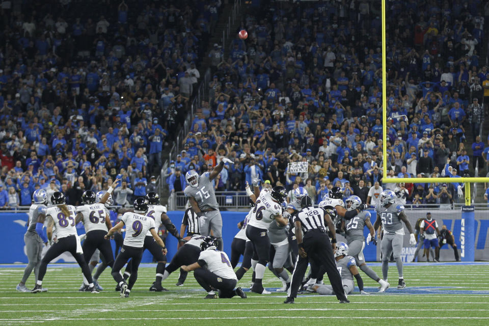 Baltimore Ravens kicker Justin Tucker (9) kicks a 66-yard field goal in the second half of an NFL football game against the Detroit Lions in Detroit, Sunday, Sept. 26, 2021. Baltimore won 19-17. (AP Photo/Tony Ding)