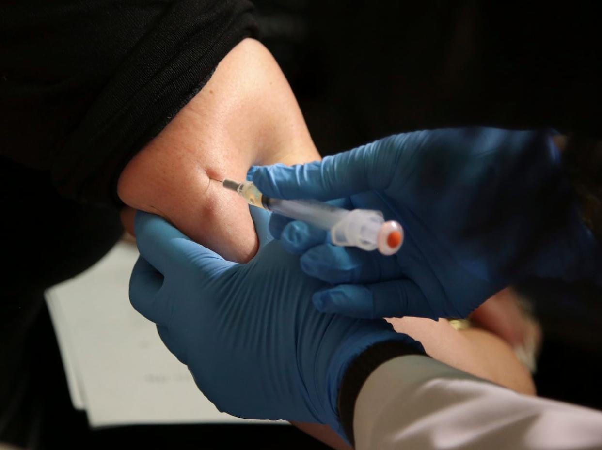 Measles is highly contagious, and can spread to others from four days before a rash appears until four days after a rash develops, the Saskatchewan Health Authority warns. It's also encouarging people to review their immunizations. (Seth Wenig/The Associated Press - image credit)