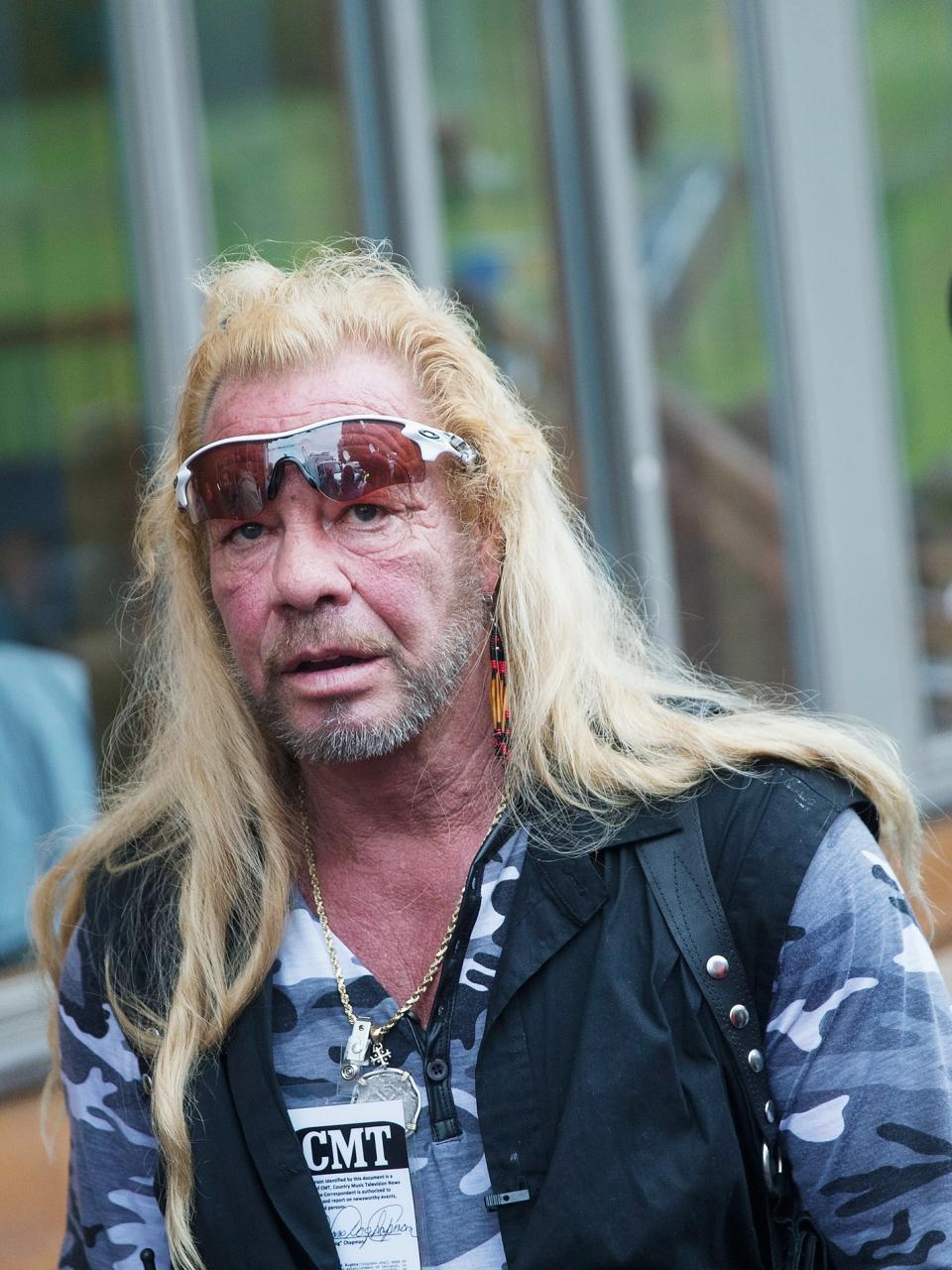 Duane Chapman filming a segment of his television show during a news conference with Governor Andrew Cuomo on June 28, 2015 in Malone, NY.