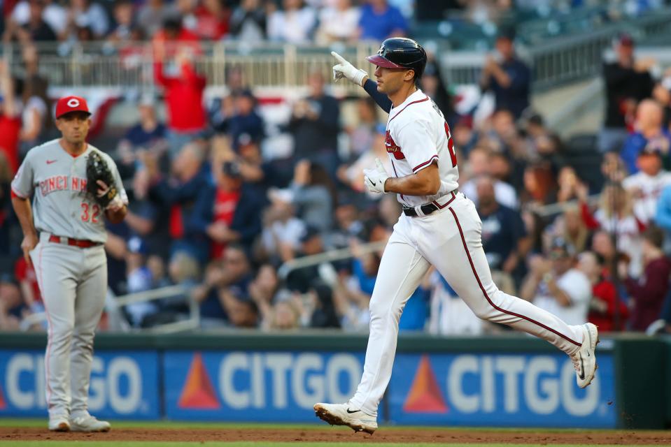Atlanta Braves first baseman Matt Olson (28) celebrates after a home run against the Cincinnati Reds in the first inning at Truist Park on Tuesday.