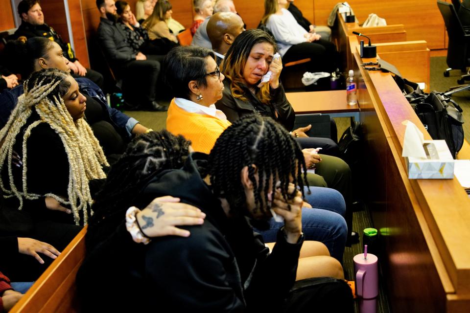 Relatives of Casey Goodson Jr. react as photos from the 23-year-old's autopsy are shown in Franklin County Common Pleas Court. Former Franklin County Sheriff's office deputy Jason Meade is charged with murder and reckless homicide in connection with Goodson's death.