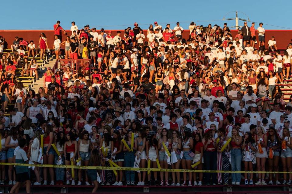 Fans on the Jesuit side fill in the stands before kickoff for the 50th Holy Bowl high school football rivalry game with Christian Brothers at Hughes Stadium in 2021.