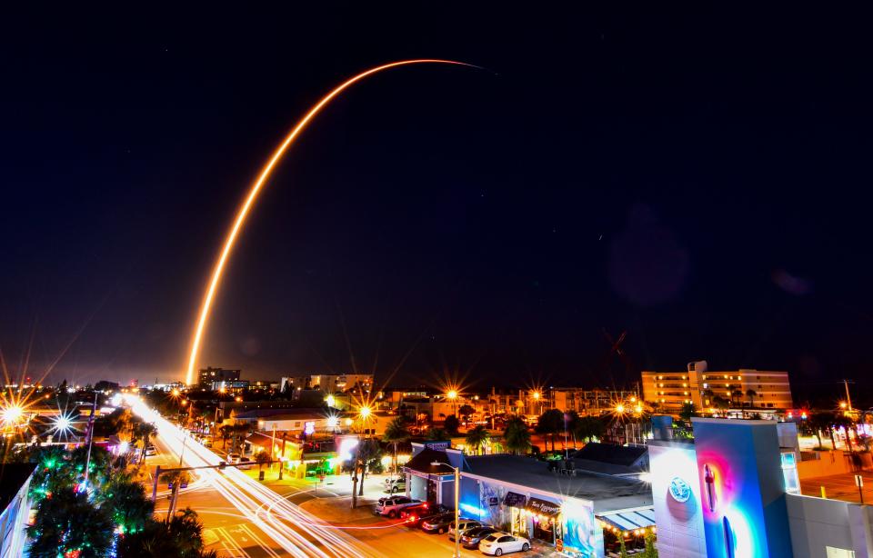 Time exposure over the skyline of Cocoa Beach of the SpaceX Falcon 9 rocket carrying the 32nd batch of Starlink internet satellites. The rocket launched at  6:12 p.m. Thursday evening from Launch Complex 40 at Cape Canaveral Space Force Station.   