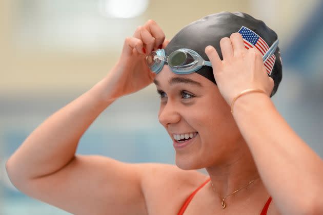 Paralympic swimmer Ali Truwit puts on goggles before practice at Chelsea Piers Athletic Club on Aug. 2 in Stamford, Connecticut.