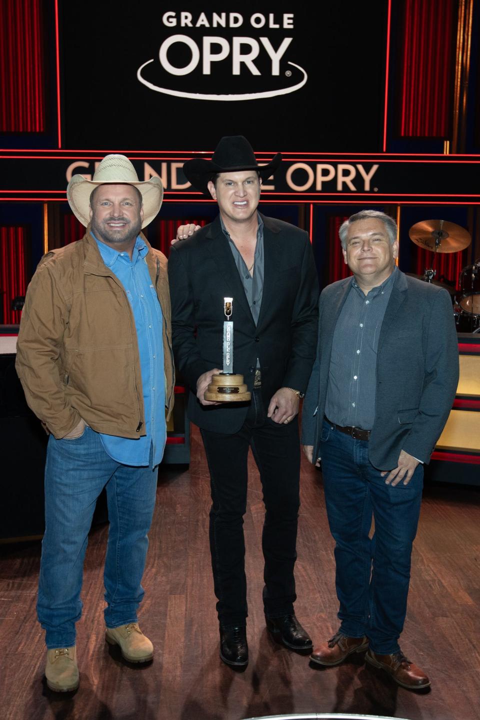 From left, Garth Brooks, Jon Pardi, and Grand Ole Opry Executive Producer Dan Rogers on  Oct. 24,