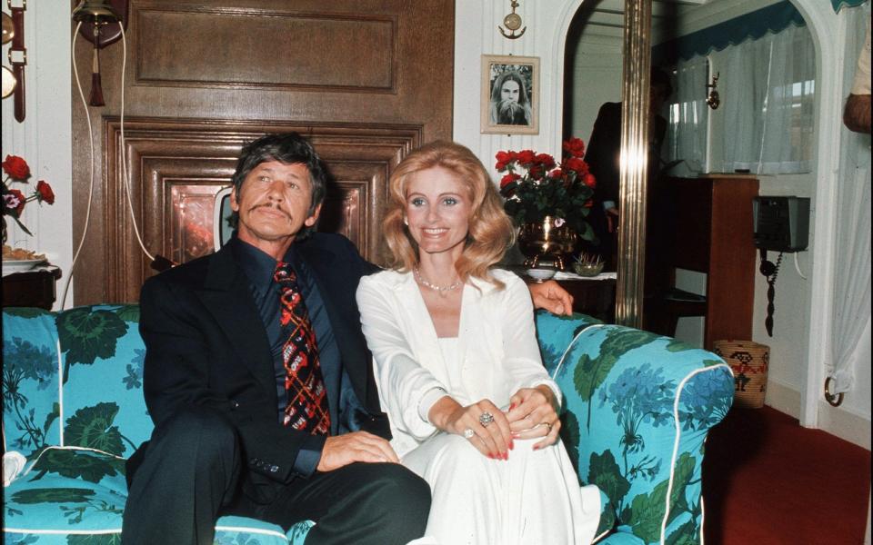 Bronson pictured with his second wife, Jill Ireland - Getty