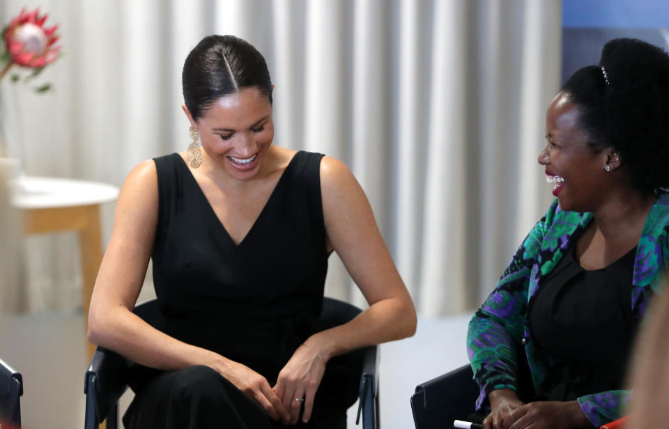 September 25, 2019: Meghan Markle shares a laugh with female entrepreneurs as she visits Woodstock Exchange in Cape Town