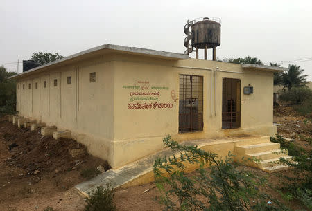 A public toilet built under the "Clean India" mission, which residents say has been shut for over a year, is pictured in Guladahalli village in the southern state of Karnataka, India, India, April 30, 2019. REUTERS/Sachin Ravikumar