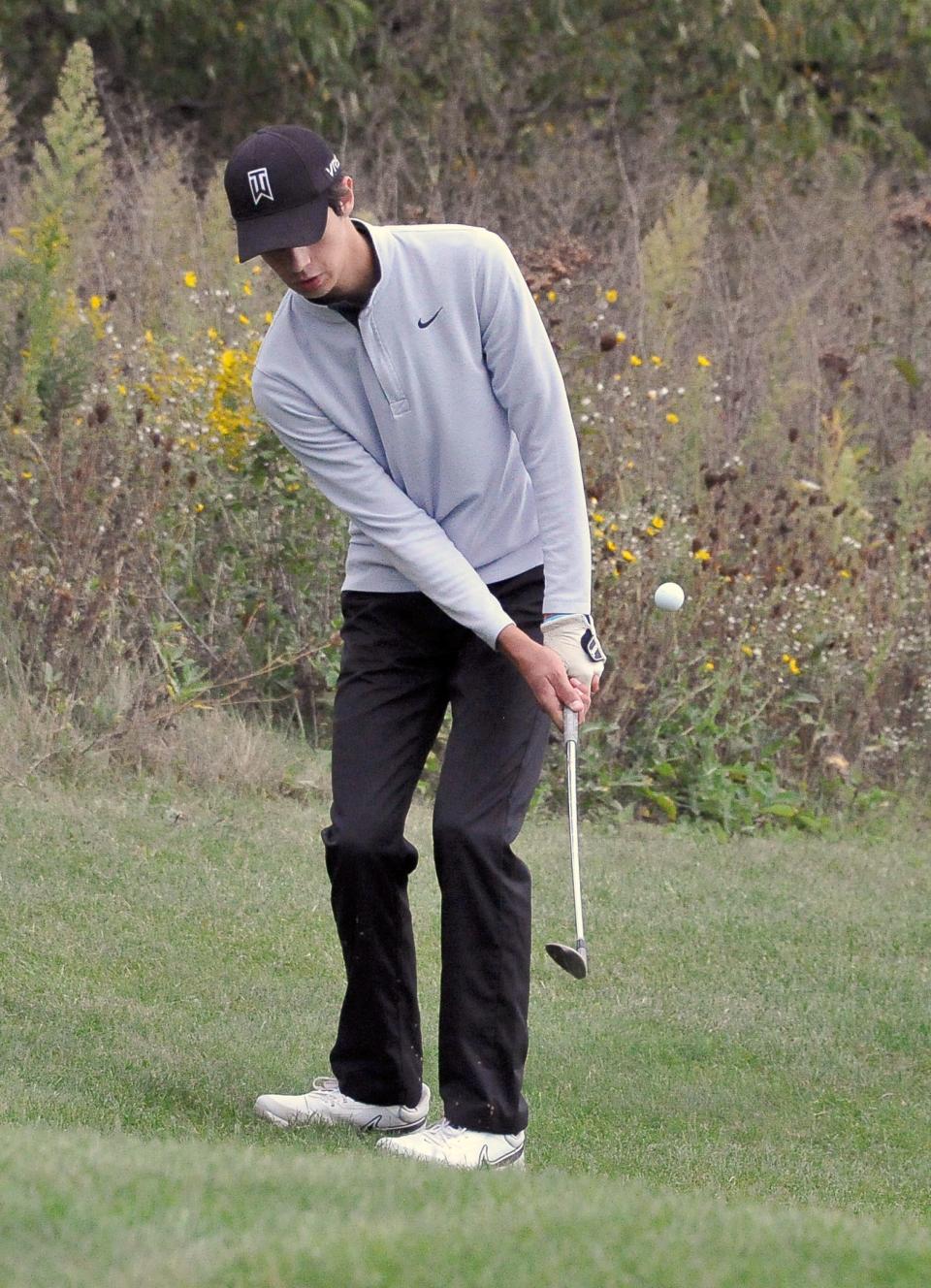 Smithville's Gavin Von Almen puts this ball on the green.